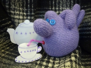 upcycled wool glove creature drinking tea